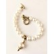 9 mm white freshwater pearl bracelet with barok pearl . Steel/gold