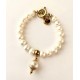 9 mm white freshwater pearl bracelet with barok pearl . Steel/gold