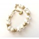 10-11mm white freshwater pearl bracelet. Steel/gold