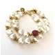 10-11mm white freshwater pearl bracelet. Steel/gold