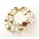 10-11mm white freshwater pearl bracelet. Steel/gold