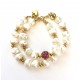 10-11mm white freshwater pearl bracelet. Steel/gold