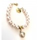 10 mm pink south sea shell pearl bracelet. with pearl. Steel/gold