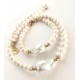 7-8 mm white freshwater pearl bracelet with big barok. Steel/gold