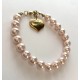 8 mm south sea shell pearl bracelet. pink. Steel/gold