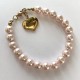 8 mm south sea shell pearl bracelet. pink. Steel/gold