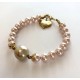 8 mm south sea shell pearl bracelet. pink with big barok Steel/gold