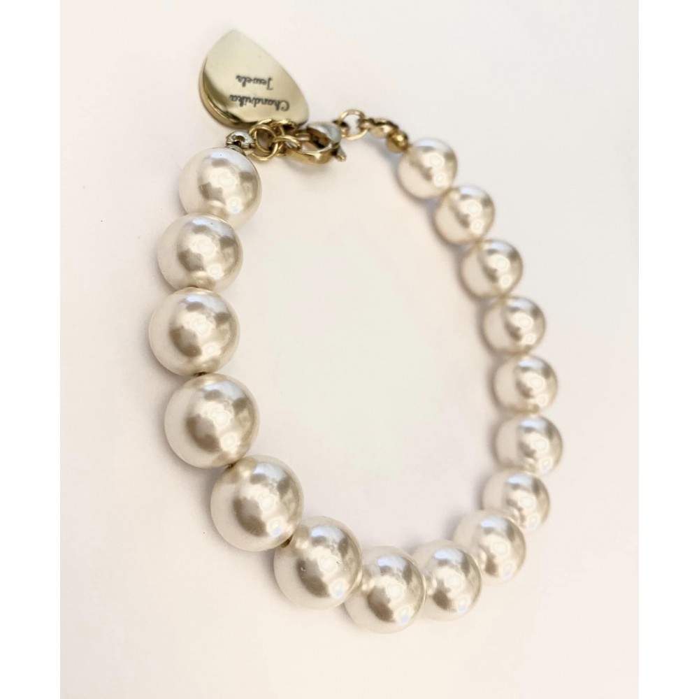 10 mm creme south sea shell bracelet stee/gold