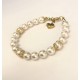 8 mm  creme south sea shell pearl bracelet. Steel/gold