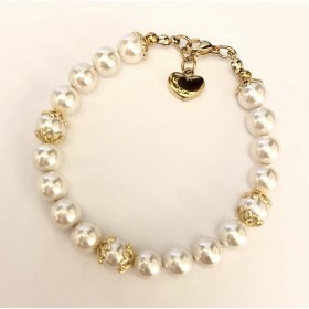 8 mm  creme south sea shell pearl bracelet. Steel/gold