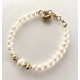 Small 5-6 mm freshwater pearl bracelet with bigger pearls. Steel/gold