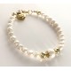 Small 5-6 mm freshwater pearl bracelet with bigger pearls. Steel/gold