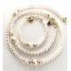 Small 5-6 mm freshwater pearl bracelet with bigger pearls. Steel/gold