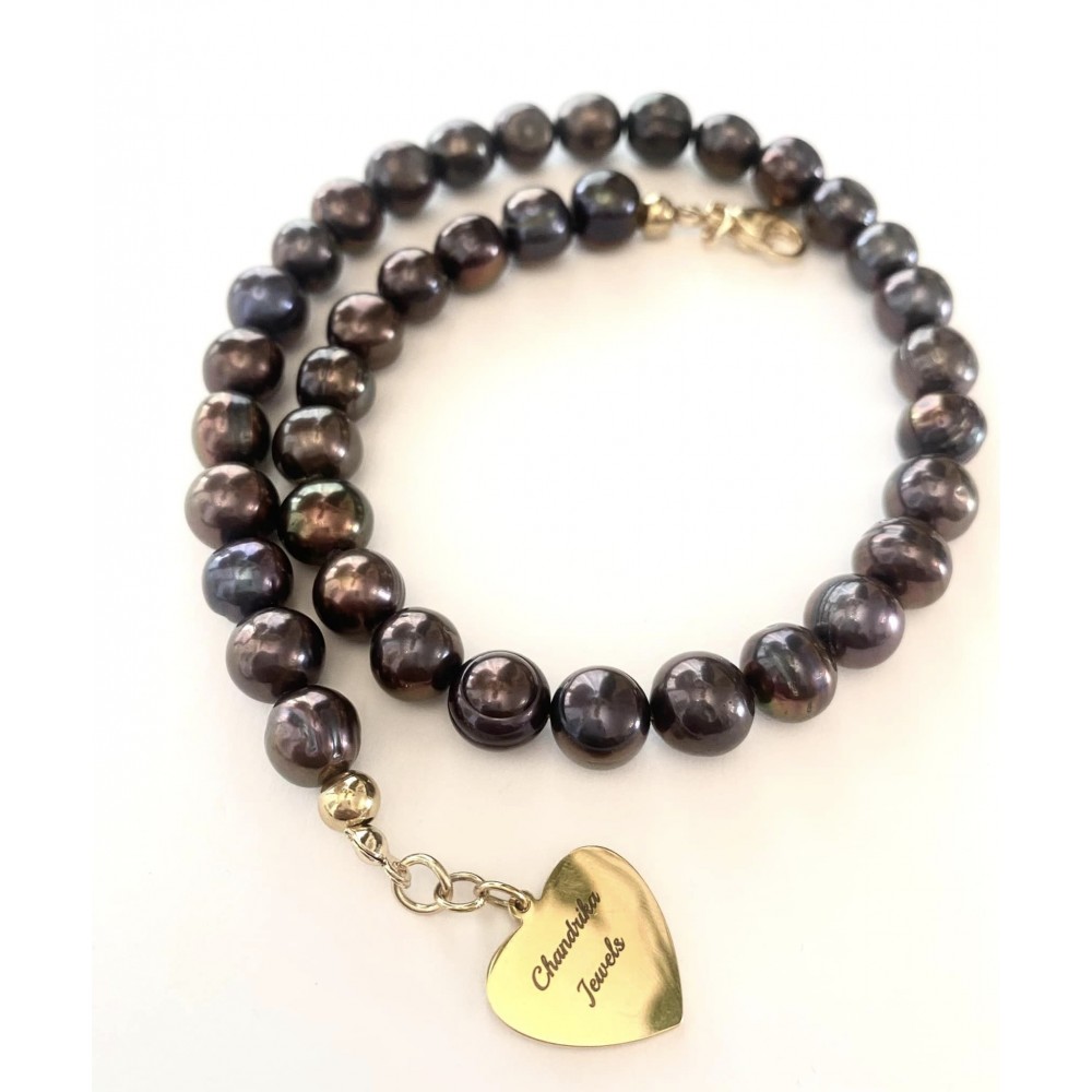 11 mm black freshwater pearl chain. Steel/gold