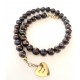 11 mm black freshwater pearl chain. Steel/gold