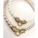 12 mm white south sea shell pearl chain. With big panther lock.