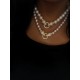 12 mm white south sea shell pearl chain. With big panther lock.